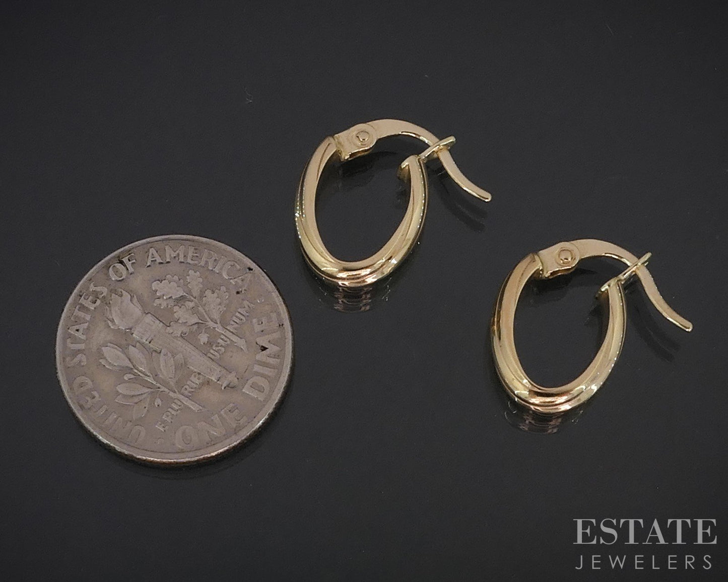 14k Yellow Gold Twisted Oval Hoop Ladies Earrings 1.2g i19029b
