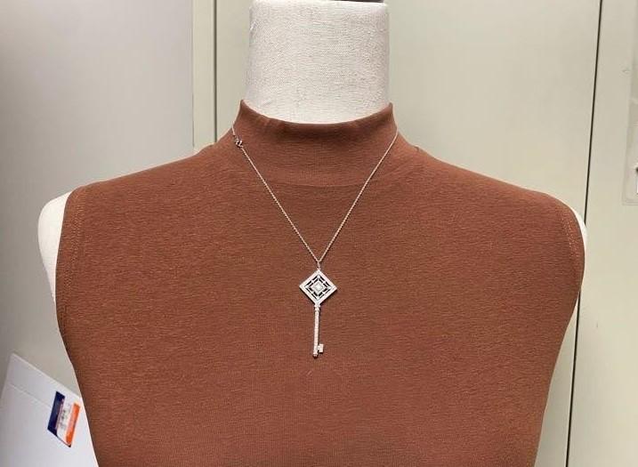 Platinum Tiffany & Co. Natural .59ctw Diamond Grace Key Pendant Necklace p59243